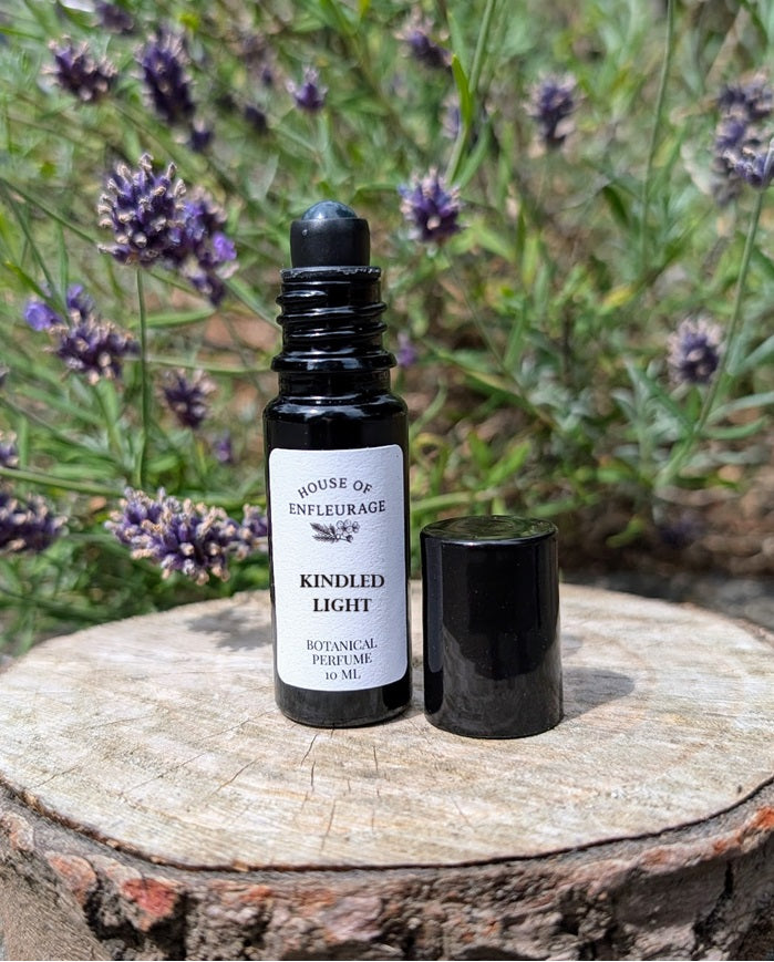 Close up of Kindled Light botanical oil perfume